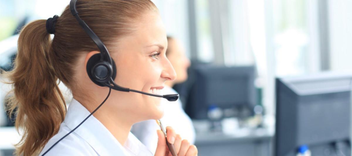 Service Excellence Page, Side view of a woman on a telephone or headset, customer service concept